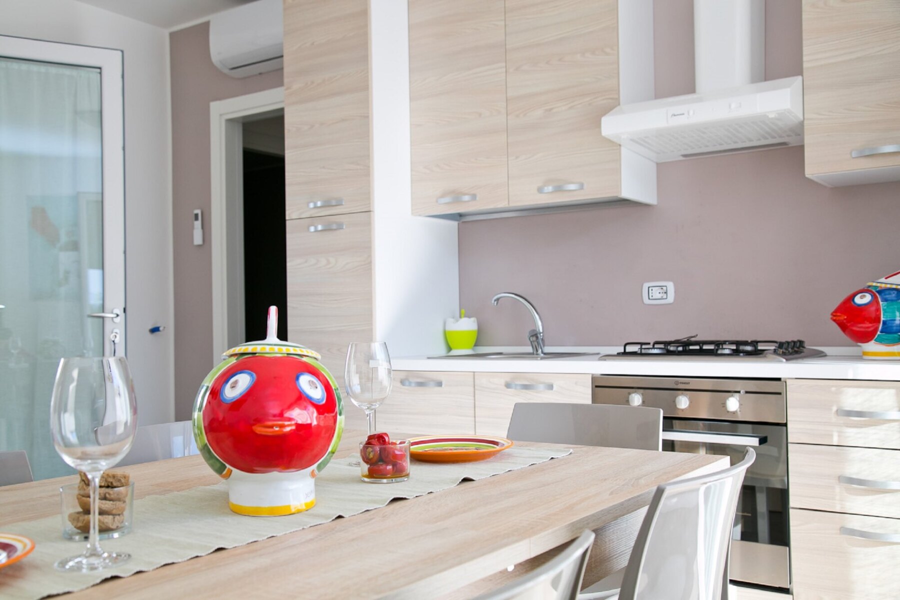 Kitchen and dining area opening outdoors
