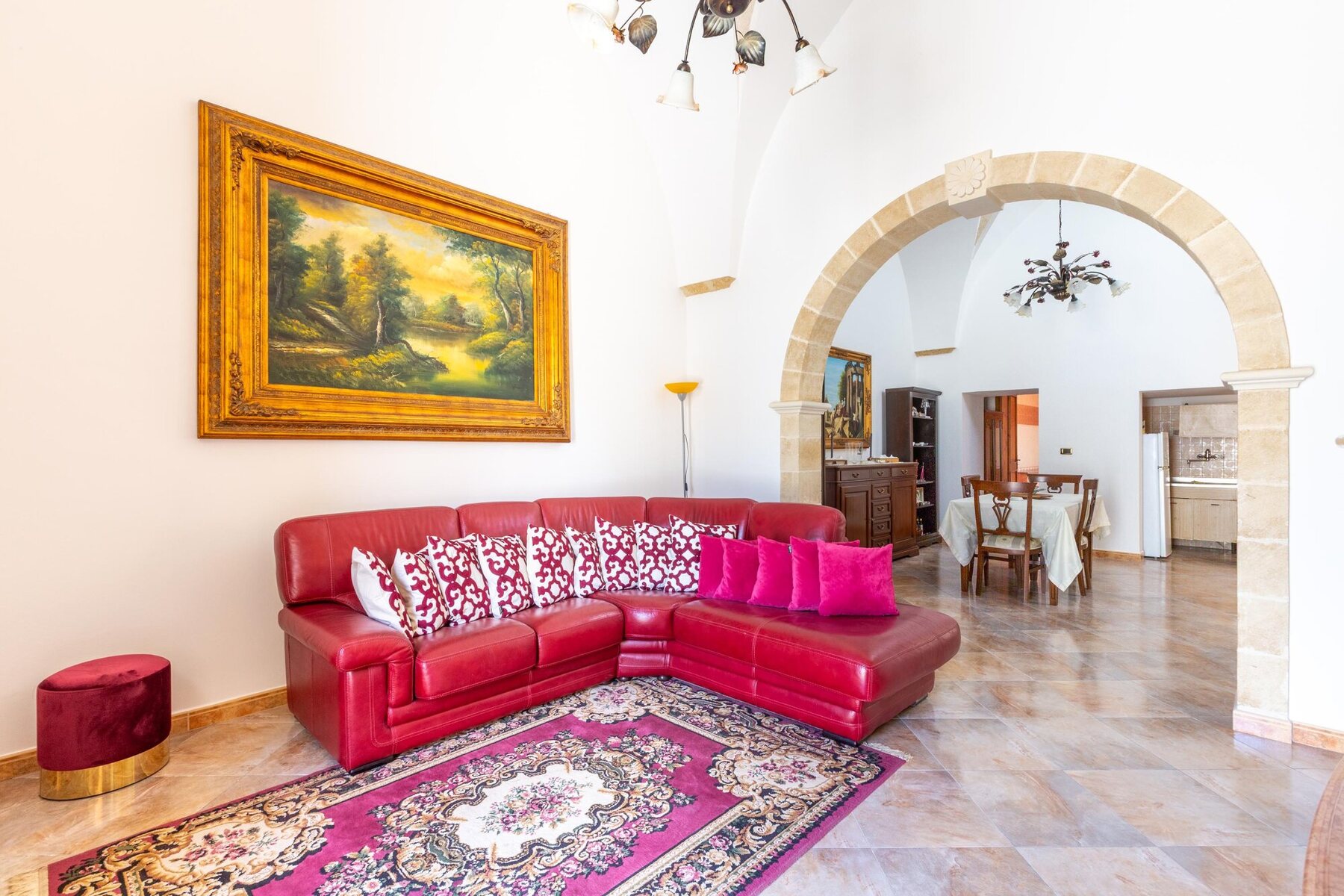 Bright living room with a traditional vault